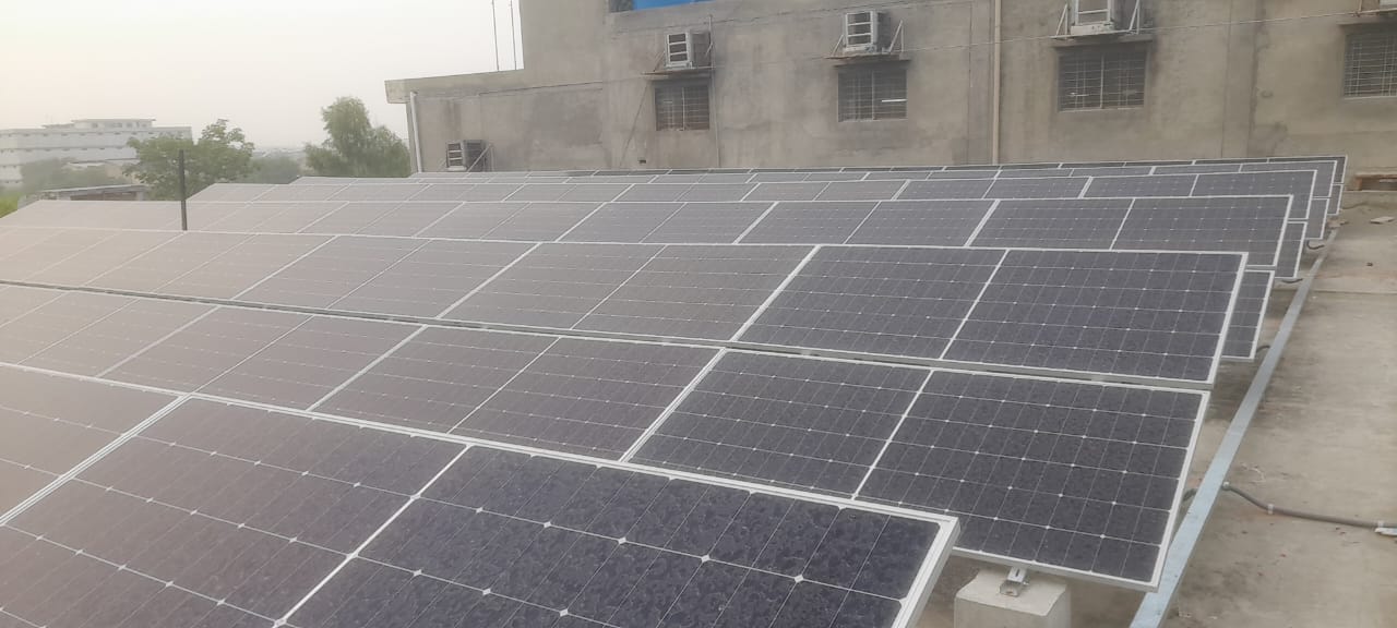 Industrial rooftop solar installation at Simba Shoes Factory